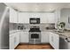 Updated kitchen with stainless steel appliances, modern cabinets, and stylish backsplash at 20121 N 76Th St # 2006, Scottsdale, AZ 85255