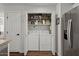 Convenient laundry closet with modern washer, dryer and storage at 20121 N 76Th St # 2006, Scottsdale, AZ 85255