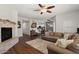 Spacious living room features wood floors, fireplace and modern design at 20121 N 76Th St # 2006, Scottsdale, AZ 85255