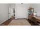 Well-organized home office with a large desk, built-in storage, and access to a half-bathroom at 20121 N 76Th St # 2006, Scottsdale, AZ 85255