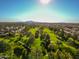 Beautiful aerial view of a lush green golf course surrounded by a residential community at 2041 W Hemlock Way, Chandler, AZ 85248