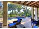 Outdoor living space featuring a pool, dining area, and golf course views at 2041 W Hemlock Way, Chandler, AZ 85248