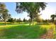 Scenic view of the golf course surrounded by mature trees and manicured greens at 2041 W Hemlock Way, Chandler, AZ 85248