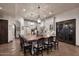 Expansive kitchen with oversized island, seating for eight, and stainless steel appliances at 2041 W Hemlock Way, Chandler, AZ 85248