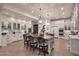 Gourmet kitchen featuring a large island, custom cabinetry, and stainless steel appliances at 2041 W Hemlock Way, Chandler, AZ 85248