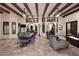 Spacious covered patio with ample seating, a fireplace, and scenic outdoor views at 2041 W Hemlock Way, Chandler, AZ 85248