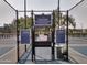 Gated entrance to the Ocotillo Community Pickleball Complex, featuring multiple courts and posted rules at 2041 W Hemlock Way, Chandler, AZ 85248