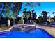 Beautiful pool area with a jacuzzi and manicured landscaping at 2041 W Hemlock Way, Chandler, AZ 85248