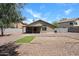 Spacious backyard with desert landscaping, mature trees, and a covered patio, perfect for outdoor gatherings at 20802 N 7Th Pl, Phoenix, AZ 85024