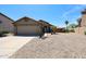 Charming single-story home featuring a two-car garage, gravel landscaping, and a desert-friendly yard at 20802 N 7Th Pl, Phoenix, AZ 85024