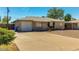 Charming single-Gathering home with an attached garage and driveway at 2213 E Campbell Ave, Phoenix, AZ 85016
