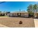 This beautiful single-story home boasts a well-kept front yard and inviting curb appeal at 2213 E Campbell Ave, Phoenix, AZ 85016