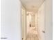 Hallway with tile flooring and access to multiple rooms at 2213 E Campbell Ave, Phoenix, AZ 85016