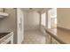 Bright eat-in kitchen features tile floors and adjacent dining space at 2213 E Campbell Ave, Phoenix, AZ 85016