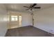 Living room with views into dining room and kitchen at 2213 E Campbell Ave, Phoenix, AZ 85016