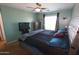 This spacious main bedroom includes carpet, ceiling fan, a large window and plenty of space at 2434 E San Manuel Rd, San Tan Valley, AZ 85143