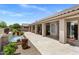 Expansive back patio with tile flooring and stucco pillars at 27953 N 111Th Way, Scottsdale, AZ 85262