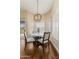 Cozy dining area with large windows and contemporary lighting fixture at 27953 N 111Th Way, Scottsdale, AZ 85262