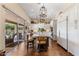 Beautiful kitchen with custom white cabinetry, granite countertops, an island, and stainless steel appliances at 27953 N 111Th Way, Scottsdale, AZ 85262