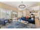 Spacious living room with a view of the backyard and ample natural light at 27953 N 111Th Way, Scottsdale, AZ 85262