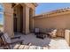 Cozy outdoor patio with seating around a fire pit, perfect for relaxing and entertaining at 27953 N 111Th Way, Scottsdale, AZ 85262