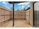 Fenced backyard featuring low maintenance landscaping and a covered patio at 286 W Palomino Dr # 103, Chandler, AZ 85225