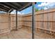 Fenced backyard featuring low maintenance landscaping and a covered patio at 286 W Palomino Dr # 103, Chandler, AZ 85225