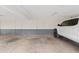 Spacious two-car garage featuring overhead lighting and convenient access doors at 286 W Palomino Dr # 103, Chandler, AZ 85225