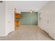 Open living area with tile floors, ceiling fan, and ample natural light at 286 W Palomino Dr # 103, Chandler, AZ 85225