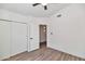 Bedroom featuring smooth flooring, closet and neutral wall color at 3026 W Ross Ave, Phoenix, AZ 85027