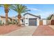 Charming single-story home featuring a grey garage door, well-maintained landscaping, and inviting curb appeal at 3026 W Ross Ave, Phoenix, AZ 85027