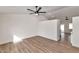 Bright and airy open-concept space featuring wood floors and a modern ceiling fan at 3026 W Ross Ave, Phoenix, AZ 85027