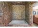 Inviting bathroom featuring a tiled tub, perfect for relaxation and creating a spa-like experience at 3120 Arroyo Hondo --, Carefree, AZ 85377
