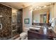 Modern bathroom featuring a glass-enclosed shower, dual sinks, and elegant finishes for a luxurious experience at 3120 Arroyo Hondo --, Carefree, AZ 85377