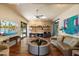 Spacious living room boasting hardwood floors, modern furnishings, and ample natural light for a comfortable atmosphere at 3120 Arroyo Hondo --, Carefree, AZ 85377