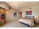 Inviting main bedroom featuring a fireplace, neutral tones, and carpeted floors at 3120 Arroyo Hondo --, Carefree, AZ 85377