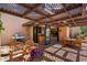 Outdoor patio with built in grill, lounge seating and seamless flow to the kitchen at 3120 Arroyo Hondo --, Carefree, AZ 85377