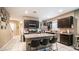 Spacious kitchen with a large island and stainless steel appliances at 33013 N Ash Tree Ln, San Tan Valley, AZ 85144