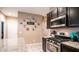 The kitchen features a gas range and modern appliances at 33013 N Ash Tree Ln, San Tan Valley, AZ 85144