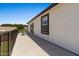 Private balcony area with sleek railings and views of the surrounding neighborhood and landscape at 3784 E Washington Ct, Gilbert, AZ 85234