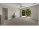 Spacious bedroom with access to a private balcony offering serene outdoor views at 3784 E Washington Ct, Gilbert, AZ 85234