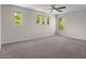 Bright bedroom with large windows offering ample natural light and a serene ambiance at 3784 E Washington Ct, Gilbert, AZ 85234