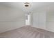 Bedroom featuring neutral carpet, a modern light and closet with sliding doors at 3784 E Washington Ct, Gilbert, AZ 85234