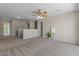 A versatile bonus room with plush carpet flooring, ready for your personal touch at 3784 E Washington Ct, Gilbert, AZ 85234