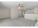 A versatile bonus room with plush carpet flooring, ready for your personal touch at 3784 E Washington Ct, Gilbert, AZ 85234