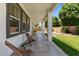 Inviting covered patio featuring ample seating, creating a perfect spot for relaxing and enjoying the outdoors at 3784 E Washington Ct, Gilbert, AZ 85234