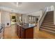 Island with stainless sink in open-concept kitchen overlooking a landscaped backyard at 3784 E Washington Ct, Gilbert, AZ 85234