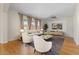 Bright and furnished living room with modern décor and large windows at 3784 E Washington Ct, Gilbert, AZ 85234