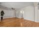 Large living room area with wood floors, neutral tones, and minimalist design at 3784 E Washington Ct, Gilbert, AZ 85234