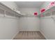 Spacious walk-in closet with ample shelving and storage for organization at 3784 E Washington Ct, Gilbert, AZ 85234